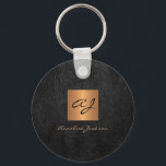 Monogram name elegant modern black gold  keychain<br><div class="desc">Luxury monogrammed keychain in dark black leather look with a faux gold copper metallic shiny square.                Easy to personalize with your or business monogram initials and name.               Could be an elegant personalized gift for business opening,  housewarming,  birthday,  Christmas or any other occasion,  personal or office accessory.</div>