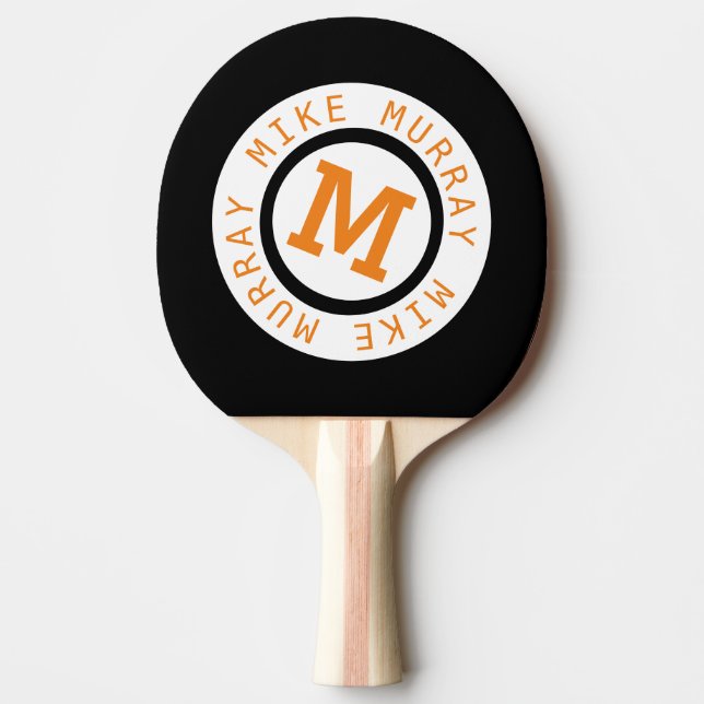 monogram on black Ping-Pong paddle (Front)