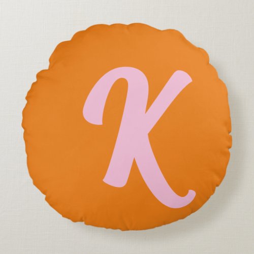 Monogram orange and pink round pillow