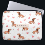 Monogram Personalized Cute Dachshund Dog Laptop Sleeve<br><div class="desc">This seamless pattern features playful dachshunds surrounded by soft pink hearts, creating a heartwarming and cheerful aesthetic. The design captures the charm and personality of dachshunds in a variety of cute poses, complemented by a bright and clean white background. Ideal for dog lovers, this pattern adds a fun and loving...</div>