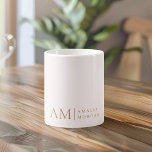 Monogram Personalized Pink Initial And Name  Coffee Mug<br><div class="desc">Enjoy your favorite beverages in style with our Minimalistic Monogram Personalized Pastel Pink Mug. Featuring a soft pastel pink background, this elegant mug is adorned with a sleek monogram initial and your custom name in a modern font. Perfect for coffee, tea, or hot chocolate, this mug combines functionality with a...</div>