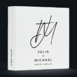 Monogram Photo Album Modern Minimalist 3 Ring Binder<br><div class="desc">Keep your cherished memories organized with this personalized photo album binder featuring a unique brush script 2 initial monogram with the couple’s name and "photo album" text below in a modern sans serif font. The spine is customizable for easy identification. This white version with black text is perfect for a...</div>
