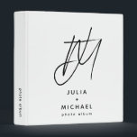 Monogram Photo Album Modern Minimalist 3 Ring Binder<br><div class="desc">Keep your cherished memories organized with this personalized photo album binder featuring a unique brush script 2 initial monogram with the couple’s name and "photo album" text below in a modern sans serif font. The spine is customizable for easy identification. This white version with black text is perfect for a...</div>