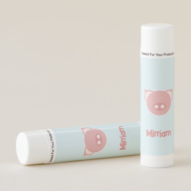 Monogram pink piglet on blue lip balm (Front)