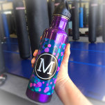 Monogram purple turquoise blue confetti dots bold stainless steel water bottle<br><div class="desc">Sparkly turquoise blue, purple, pink, and green confetti dots on a dark teal background adorn this chic, modern monogramed stainless steel water bottle. Add a sense of style to your workout. Makes a fun statement every time you use it. Customize the bottle color with one of 10 colors or leave...</div>