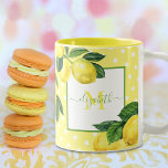 Monogram rustic country lemon watercolor polka dot Two-Tone coffee mug<br><div class="desc">Take a moment to relax with your favorite morning beverage with this beautiful, chic, simple, modern, custom monogram name coffee mug. Fresh, rustic, country watercolor lemons and green leaves, along with grass green handwritten script typography, overlay white polka dots on a light yellow background. Personalize with your name and monogram...</div>