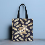 Monogram Tropical Pineapple Girly Gold Navy Tote Bag<br><div class="desc">This modern tropical design features gold pineapples on a navy blue background with your personalized monogram in the center. Personalize by editing the text in the text box provided. #monogram #monogrammed #initial #personalized #tropical #pineapple #girly #feminine #fruit #gold #navy #navyblue #golden #chic stylish #elegant #feminine #giftsforher #blue #accessories #tote #bags...</div>