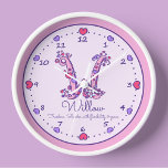 Monogram W hearts girls name meaning pink clock<br><div class="desc">Monogram letter W hearts and flowers in pink and purple add your own name clock, currently reads Willow Freedom. Slender with flexibility & grace or you can personalize with your own name and name meaning or message. Cute doodle drawing design of the letter W surrounded by clock numbers and hearts....</div>
