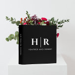 Monogram Wedding Album Classic Chic Minimal White 3 Ring Binder<br><div class="desc">Embrace the timeless elegance of our Monogram Wedding Album Classic Chic Minimal White 3-ring binder as you embark on the journey of preserving your wedding memories. This personalized guestbook is a true symbol of sophistication, adorned with a simple and classic monogram in black and white, featuring the initials of the...</div>
