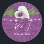 Monogram White and Purple Calla Lily Wedding Classic Round Sticker<br><div class="desc">Create your own elegant calla lily stickers personalized with your calligraphy script monogram initials and wedding date. The rustic watercolor art by Raphaela Wilson portrays a heart shaped white and purple calla lily flower with a gold stamen, greenery leaves, and romantic string lights. The background is a lovely shade of...</div>