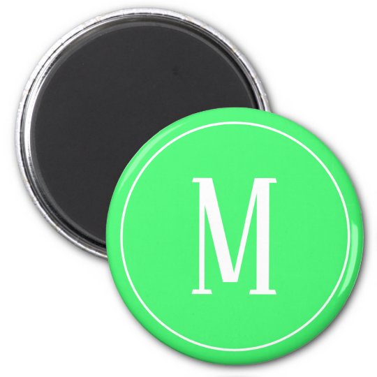 white on light green monogram magnet