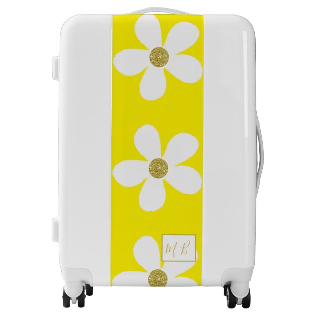white and gold suitcase