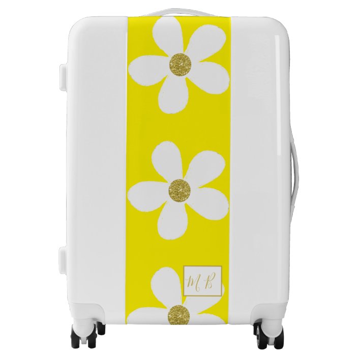 white and gold luggage