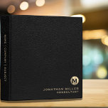 Monogrammed Black Leather Gold<br><div class="desc">Keep your important documents organized with this elegant black leather 3 ring binder featuring a brushed monogram medallion with your name and title in classic block typography. The binder has a luxurious black leather print background and a gold initial monogram that adds a touch of sophistication to your workspace. Perfect...</div>