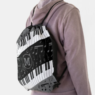 Monogrammed curve piano keys and musical notes drawstring bag