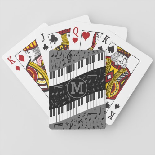 Monogrammed curve piano keys and musical notes playing cards