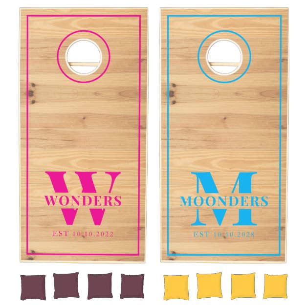 Monogrammed decal pink blue Image Dual Family Name Cornhole Set