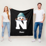 Monogrammed Family Christmas Custom Cute Snowman Fleece Blanket<br><div class="desc">Add a charming touch to your family's Christmas celebrations with our Monogrammed Family Christmas Custom Cute Snowman Fleece Blanket. This personalized fleece blanket is perfect for keeping your loved ones warm and cozy during the holiday season. Customize this blanket with your family's names and create a unique keepsake that's ideal...</div>
