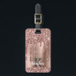 Monogrammed Rose Gold Glitter Drips on Pink Metal Luggage Tag<br><div class="desc">Modern, girly rose gold glitter drips name and monogrammed luggage tag. This design features blush pink rose gold glitter sparkle drips on pink brushed metal background with custom personalized monogram initial and first name text template. Perfect feminine gift. Please note, this design is printed photo effect. If you need help...</div>