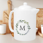 Monogrammed Watercolor Sage Green Leaves Wreath Teapot<br><div class="desc">Introducing our Monogrammed Watercolor Sage Green Leaves Wreath teapot. Featuring an elegant watercolor illustration of leaf wreath,  give a nature accent to your morning drink. Personalize the text and make it your!</div>