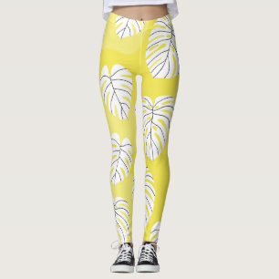 Monstera leaves, bright yellow background. leggings