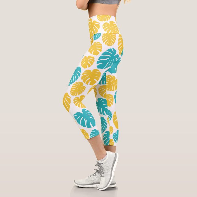 Monstera Leaves in Turquoise, Yellow, and White Capri Leggings (Left)