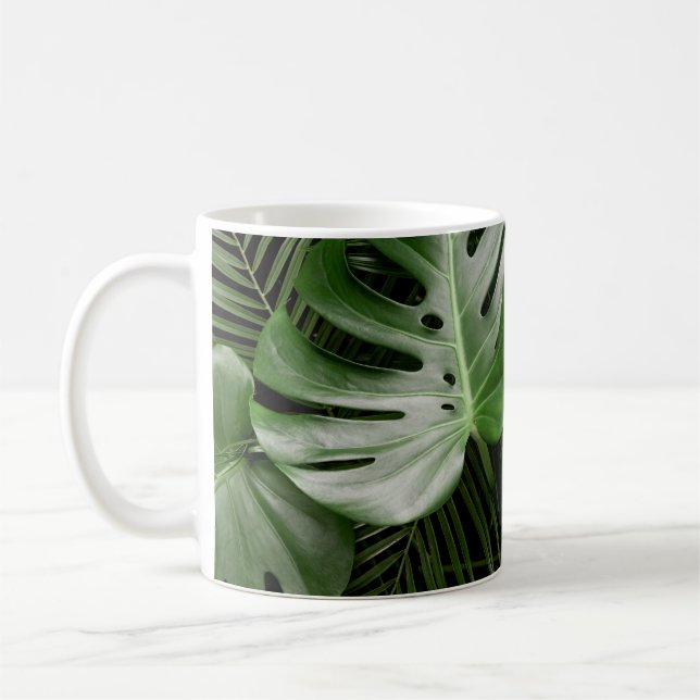 Monstera leaves, luxury tropical layout. coffee mug (Left)