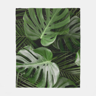 Monstera leaves, luxury tropical layout. fleece blanket