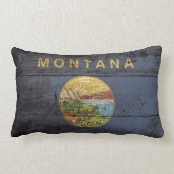 Montana State Flag On Old Wood Grain Lumbar Pillow by electrosky at Zazzle