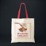 Montreal Quebec Poutine a Ring on it Bachelorette Tote Bag<br><div class="desc">Transform your bachelorette party into an unforgettable experience with our chic and playful "He's Poutine a Ring on It!" tote bag. Perfect for any bride-to-be with a love for culinary fun and modern elegance, this tote features a stylish illustration of a hand adorned with an engagement ring dipping into a...</div>