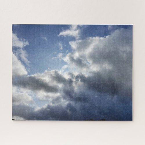 Moody clouds in Cornish blue sky Jigsaw Puzzle