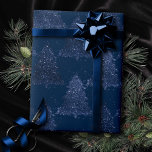 Moody Tree Pattern | Classy Navy Blue Christmas Wrapping Paper<br><div class="desc">Tis the season for rich creative, artsy custom color! Modern, dark, and moody patterned holiday design with a fun festive jewel tone palette features a whimsical sparkly Christmas trees with a frisky paint splatter enhanced with faux metallic glitter along with a matching low profile solid background. For other colors or...</div>