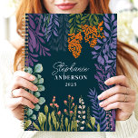 Moody Tropical Botanical Floral Custom Name Planner<br><div class="desc">This beautiful design features a lush botanical arrangement of vibrant foliage and florals in shades of purple, orange, green, and cream, set against a rich teal background. The personalized name and year add a refined touch, making it perfect for students, professionals, or nature enthusiasts. Ideal for organizing daily tasks, journaling,...</div>