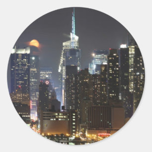 Moon rises over midtown New York. Classic Round Sticker