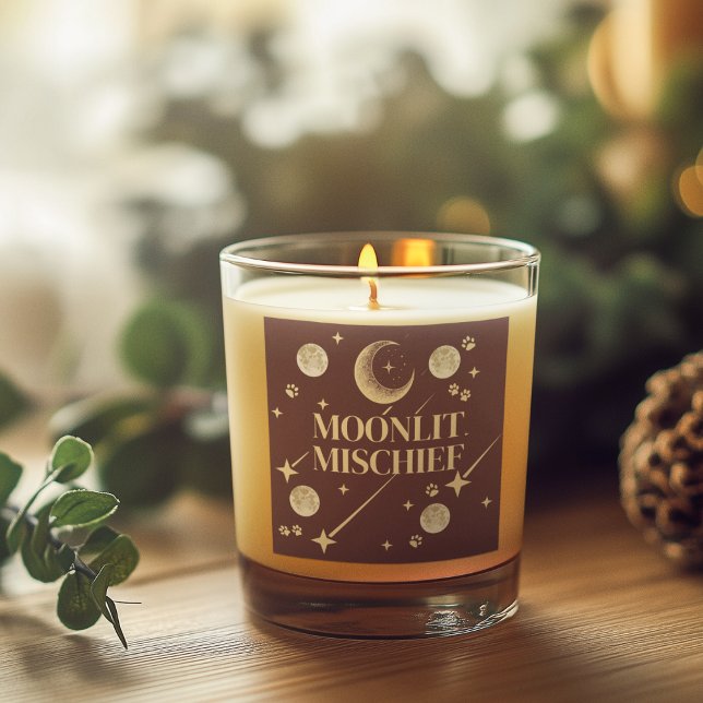 Moonlit Mischief Scented Candle (A sophisticated Halloween candle blending dusty plum tones with celestial gold accents.)