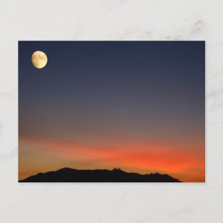 Moonrise over sunset postcard