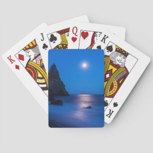 Moonrise reflection on ocean and sea stacks poker cards