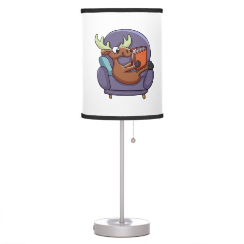 Moose reading a book on a sofa  choose back color table lamp