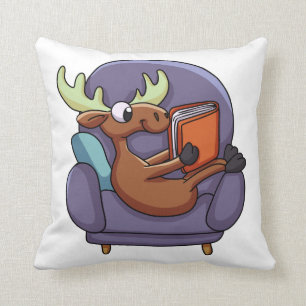 Moose reading a book on a sofa choose back color throw pillow