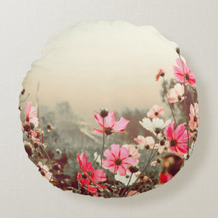 Morning light, blooming pink cosmos. round pillow