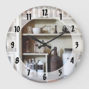 Mortar and Pestle and Bottles on Shelves Large Clock