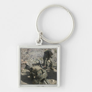 Mortarmen cover their ears and avert their eyes keychain