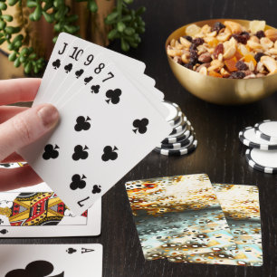 Mosaic scraps thrown over gray and coral texture poker cards