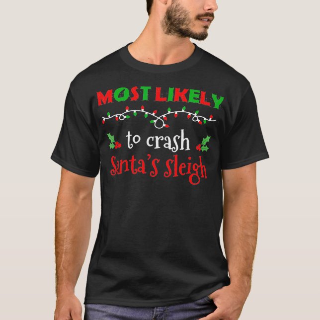 Most Likely to Crash Santa's Sleigh Funny Xmas Say T-Shirt (Front)