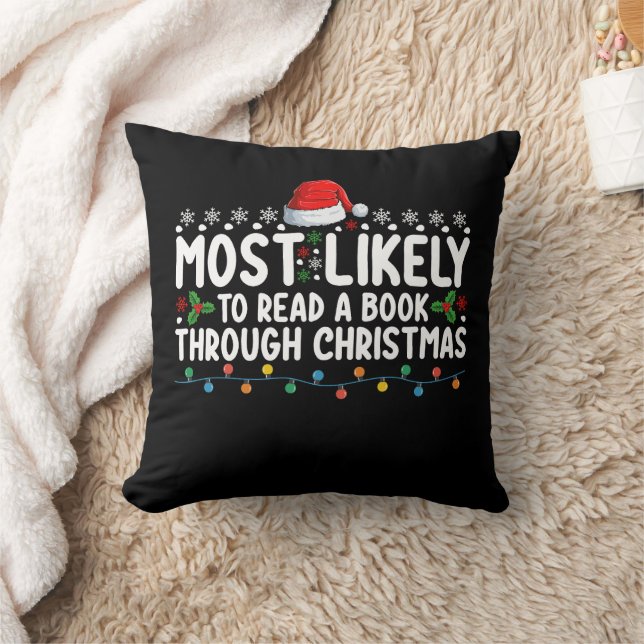 Most Likely To Read A Book Through Christmas Throw Pillow (Blanket)