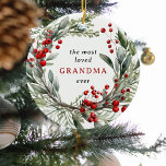 Most Loved Grandma Ever Festive Wreath Christmas  Ceramic Ornament<br><div class="desc">Let Grandma know how much she is loved this holiday season with this beautiful watercolor botanical festive wreath adorned with winter foliage and red berries Christmas Ornament. The text reads - the most loved GRANDA ever with the option to add names of grandchildren on the reverse. Cute gift for grandma...</div>