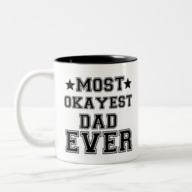 MOST OKAYEST DAD EVER Two-Tone COFFEE MUG (Left)