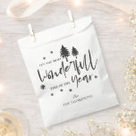 Most Wonderful Time of The Year Christmas  Quote Favor Bag<br><div class="desc">Most Wonderful Time of The Year Christmas Quote Favor Bag . This elegant gift bag has a white background with the Christmas quote "ITS THE MOST WONDERFUL TIME OF THE YEAR " written in pretty typography style font along with the family name. Customize it by changing the name . For...</div>
