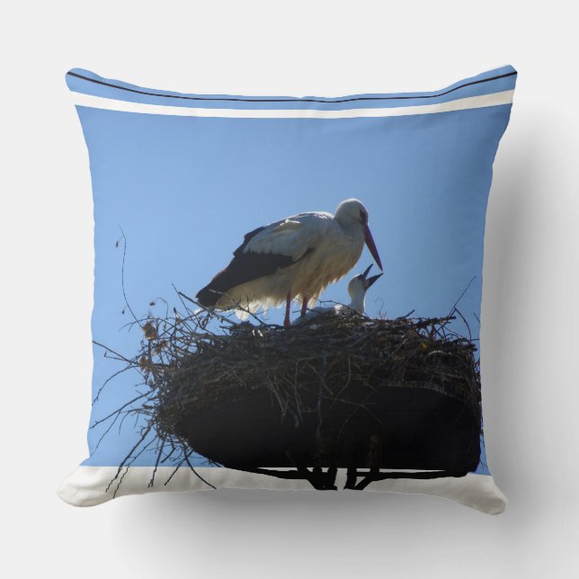 Mother and Baby Storks Throw Pillow (Front)