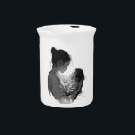 Mother & Baby artwork Beverage Pitcher<br><div class="desc">This artwork shows a gentle, intimate moment between a mother and her baby, filled with soft light and quiet emotion. The simple black-and-white style highlights the deep bond and tenderness they share. Designed to be timeless and versatile, this artwork is perfect for wall art, nursery décor, gifts, and many other...</div>